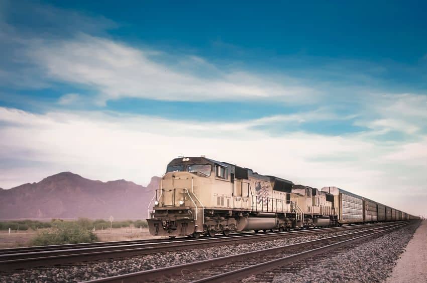 freight train travelling arizona desert