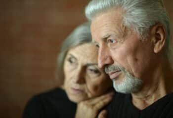sad elderly couple