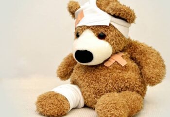 injured and bandaged teddy bear