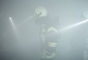 search rescue fire explosion, view of fire safety person in smoke
